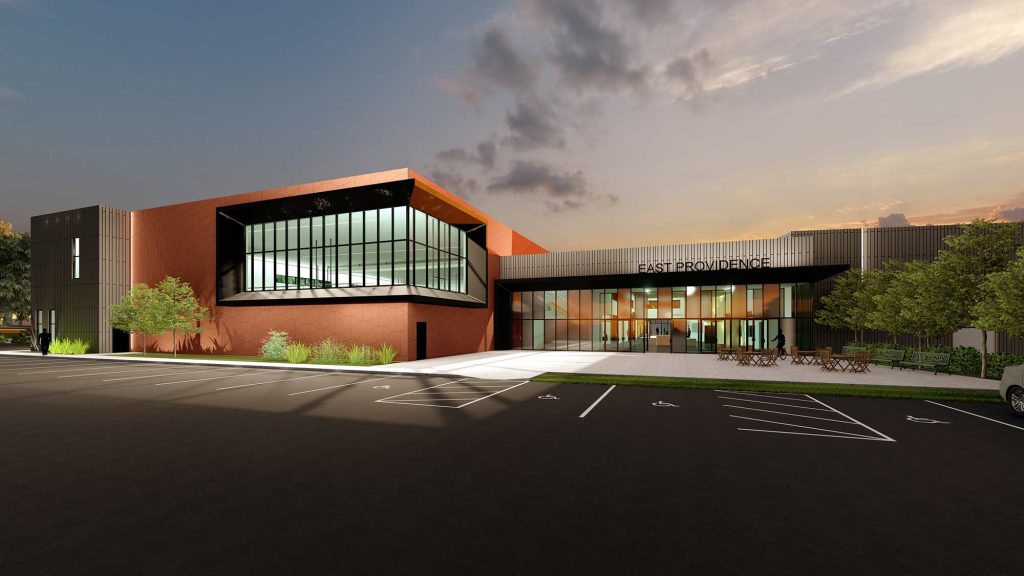 Building architecture design for East Providence Community Center in East Providence, RI: architecturally designed to accommodate a gym, a National Federation of State High School Associations regulated swimming pool, a fully functioning auditorium, and community conference rooms